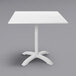 A white square BFM Seating Beachcomber-Bali table with a white metal base.