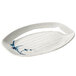 A white oval melamine tray with blue bamboo designs.