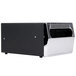 A black and silver Vollrath wall-mounted napkin dispenser box.