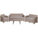 A Flash Furniture faux rattan patio set with a table, chair, loveseat, and couch with white cushions.