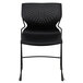 A black Flash Furniture stack chair with a full back and metal legs.