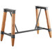 A Lancaster Table & Seating wooden trestle table base with metal supports for a bar table.