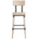 A Lancaster Table & Seating rustic wooden bar stool with a black seat.