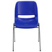 A Flash Furniture navy blue plastic chair with a hole in the back and metal legs.