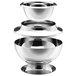 A close-up of a stack of stainless steel Walco Soprano bowls.