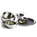 A group of Libbey stainless steel balti bowls on a table with fruit and berries.