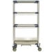 A MetroMax i mobile four tier rack with drip tray on wheels.