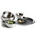 A group of Libbey Sonoran stainless steel bowls on a table filled with fruit and berries.
