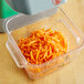 Shredded carrots made with the AvaMix 5/32" Julienne Disc in a food processor.