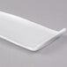 An American Metalcraft white rectangular porcelain serving platter with a curved edge.
