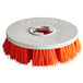 A white circular MotorScrubber orange aggressive duty brush with orange bristles.