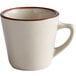 A white coffee mug with a brown rim.
