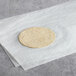 A Mission Super Soft white corn tortilla on a white surface.