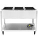 A silver rectangular Vollrath hot food table with three bins.