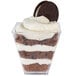 A Fineline Tiny Temptations clear plastic cup filled with a chocolate and white dessert.