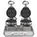 A Waring Quad Belgian Waffle Maker with two plates for two waffles on top.