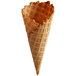 A close-up of a JOY waffle cone with a hole in it.