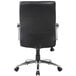 A black office chair with chrome base and black leather seat.