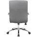 A Boss gray office chair with chrome base and wheels.
