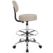 A Boss beige vinyl drafting stool with backrest and footrest on a chrome base.