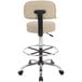 A Boss beige vinyl drafting stool with a metal base and chrome wheels.