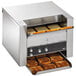 A Vollrath conveyor toaster with bread inside.