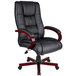A black Boss office chair with mahogany arms.