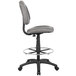 A Boss gray armless drafting stool with a black base and foot rest.