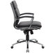 A Boss black office chair with chrome arms and base.