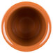 A close up of a brown Cal-Mil Terra Cotta flatware cylinder.
