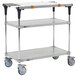 A Metro PrepMate MultiStation, a three tiered metal cart with wheels and a cutting board.
