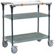 A Metro PrepMate MultiStation, a three tiered metal cart with wheels and a shelf.