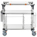 A stainless steel Metro PrepMate MultiStation cart with two shelves and wheels.