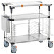 A silver Metro PrepMate MultiStation with stainless steel shelves and black wheels.