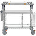 A Metro PrepMate MultiStation cart with galvanized wire shelves on wheels.