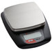 A Taylor stainless steel digital portion scale with a black and silver plate.