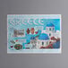A Choice paper placemat with a Greek themed design including a picture of Greece and a blue roof.