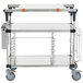 A Metro stainless steel cart with shelves and trays on wheels.