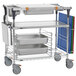 A Metro stainless steel PrepMate MultiStation with metal trays on wire shelving.
