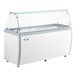 An Avantco white and grey refrigerated ice cream dipping cabinet with a glass sneeze guard.