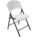 A white Lifetime light-duty folding chair with black legs.