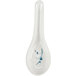 A white spoon with a blue bamboo design on it.