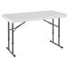 A Lifetime white rectangular plastic folding table with metal legs.