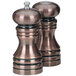 A Chef Specialties burnished copper salt and pepper mill set with silver lids.