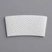 A white customizable embossed coffee cup sleeve with a white pattern.