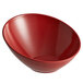 A red bowl on a white background.