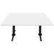 A white Art Marble Furniture table with a winter white quartz top and black legs.