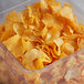 A plastic container full of Martin's Jalapeno Kettle-Cook'd Potato Chips.
