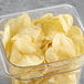 A clear container of Martin's Sea Salted Potato Chips.