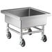 A large stainless steel Regency mobile sink with wheels.